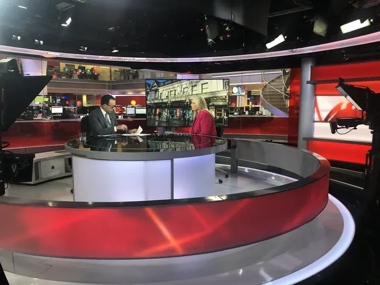 Alison at the BBC News studio desk, discussing the closure of Beales.