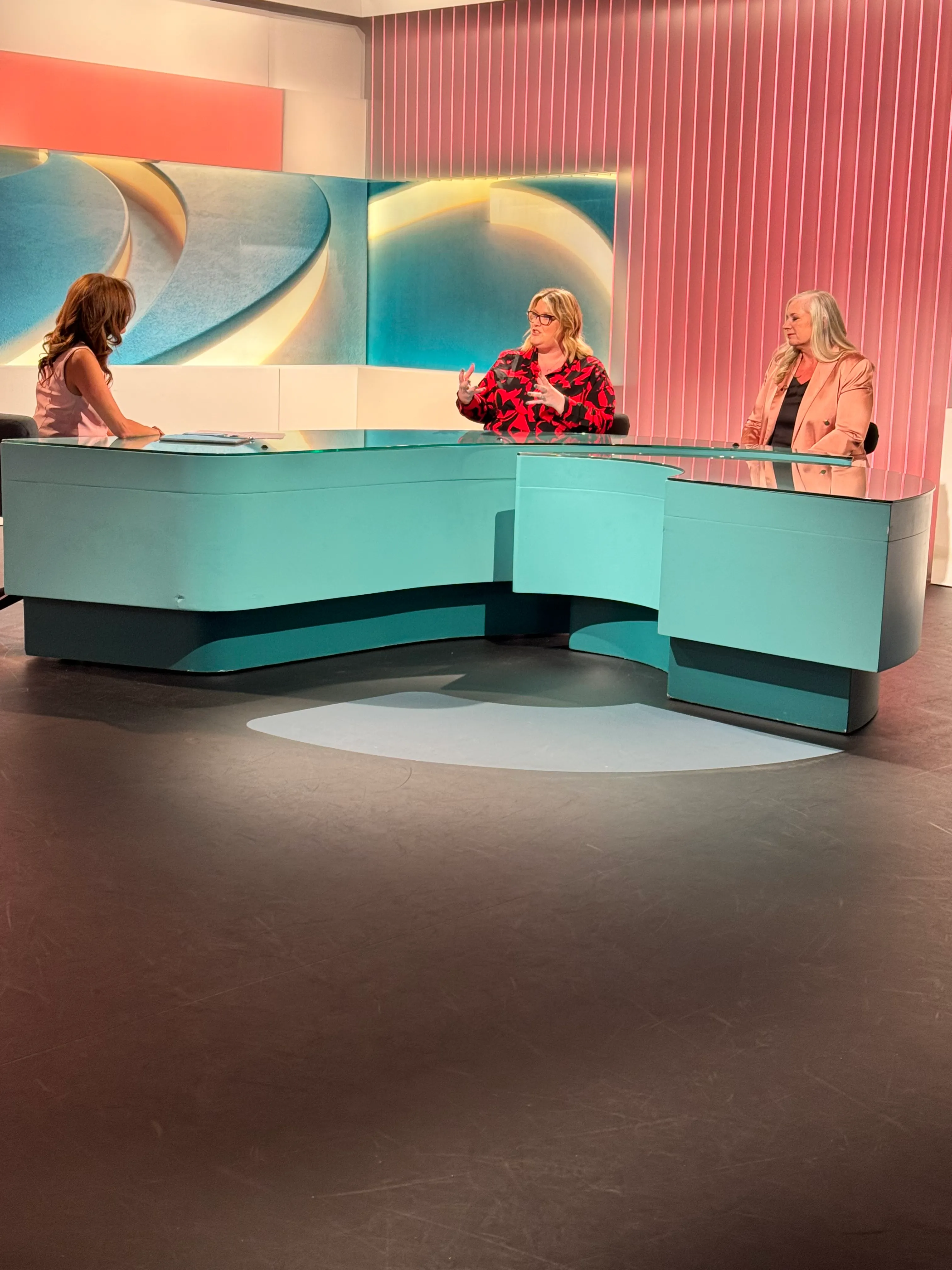 Alison at the studio desk during a Channel 5 discussion programme.