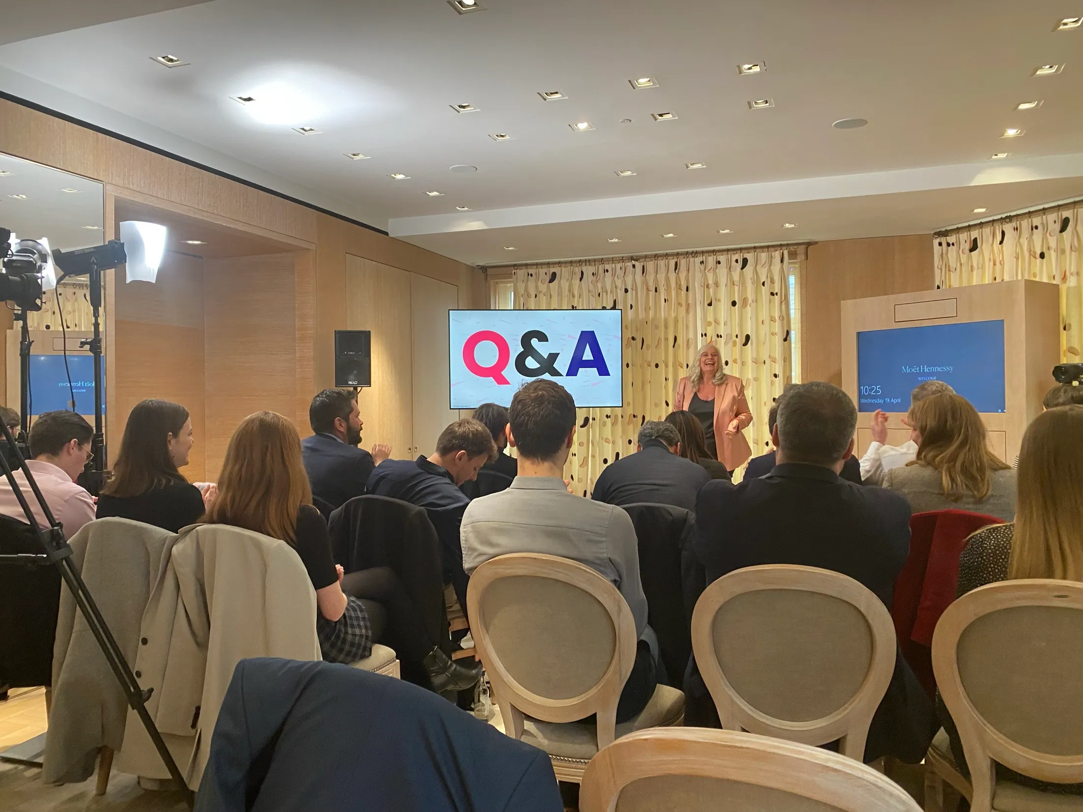 The Q&A session, Alison taking questions from the LVMH audience.